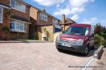 Driveway installed with Tegula paving with added jumper block, kerbs installed to retain split levels and feature circle lawn and fencing installed.