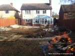 DURING: Lawn is removed topsoil installed and levelled and patio starts to take shape