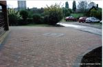 Driveway installed with Marshall's Driveline 50 pavers in brindle with feature diamond pattern 