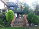 Garden needed a new landscape to match the character of the property a Sweeping ramp was installed with timber curved arbour, tumbled sandstone paving & circle installed and in cased with old stock brickwork capped with double bullnose steps built  with m