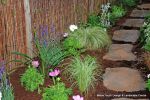 Sensory garden installed at childrens nursery and planted out to allow children to learn more about sight, sound, feel and smell 