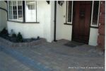 New driveway installed using Marshall's Tegula paving with contrasting charcoal border