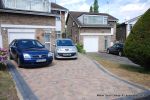 Driveway installed with Marshalls Driveline 50 in a mix of colours with Charcoal soldier course