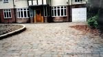 New driveway installed using Marshall's Tegula paving with contrasting charcoal border