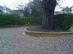 Sweeping sandstone path installed leading to front door, driveway perimeter edged with sandstone setts all hand pointed, Natural sandstone wall constructed with crease tile and 6mm Scottish beach gravel installed to drive