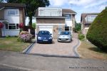 Driveway installed with Marshalls Driveline 50 in a mix of colours with Charcoal soldier course