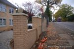 Double brick walls & pillars using matching brick to property with brick on edge to finish