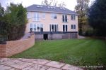 Property was resdential care home ramped pathway was constructed leading from the front of the property to the very rear, retaining walls built with interlocking blocks with added rebar and fresh concrete for strength and faced with house brick, Composite