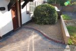 Driveway installed with Marshalls Driveline 50 in a mix of colours with Charcoal soldier course