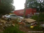 BEFORE: The front of the property was a mess after the building works with rubbish and clay everywhere