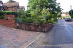 Treated timber sleeper retaining wall