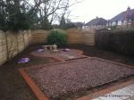 Staffordshire pink gravel & cobbles edged with brick on edge