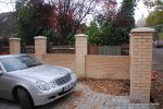 Double brick walls & pillars using matching brick to property with brick on edge to finish