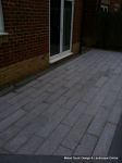 New Granite patio and path installed with contrasting dark coulour band