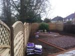 Garden was very overgrown this was cleared and new curve top fence panels installed garden was landscaped with Staffordshire pink gravel with red brick edge ready for planting in the spring 