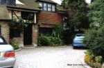 Sweeping curved driveway installed with Marshall's Tegula paving and Kerbs