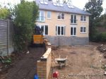 DURING: Ramped pathway built leading from the front of the property to the very rear, retaining walls built with interlocking blocks with added rebar and fresh concrete for strength and faced with house brick