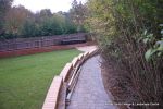 Property was resdential care home ramped pathway was constructed leading from the front of the property to the very rear, retaining walls built with interlocking blocks with added rebar and fresh concrete for strength and faced with house brick, Composite