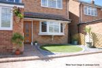 Driveway installed with Tegula paving with added jumper block, kerbs installed to retain split levels and feature circle lawn and fencing installed.