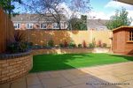 Curved brick planter wall using old stock bricks with single bull nose capping