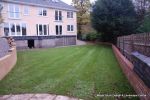 AFTER: New lawns installed and tumbled block paving in graphite grey 