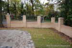 Property was resdential care home ramped pathway was constructed leading from the front of the property to the very rear, retaining walls built with interlocking blocks with added rebar and fresh concrete for strength and faced with house brick, Composite