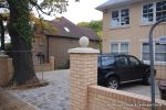 Property was resdential care home ramped pathway was constructed leading from the front of the property to the very rear, retaining walls built with interlocking blocks with added rebar and fresh concrete for strength and faced with house brick, Composite